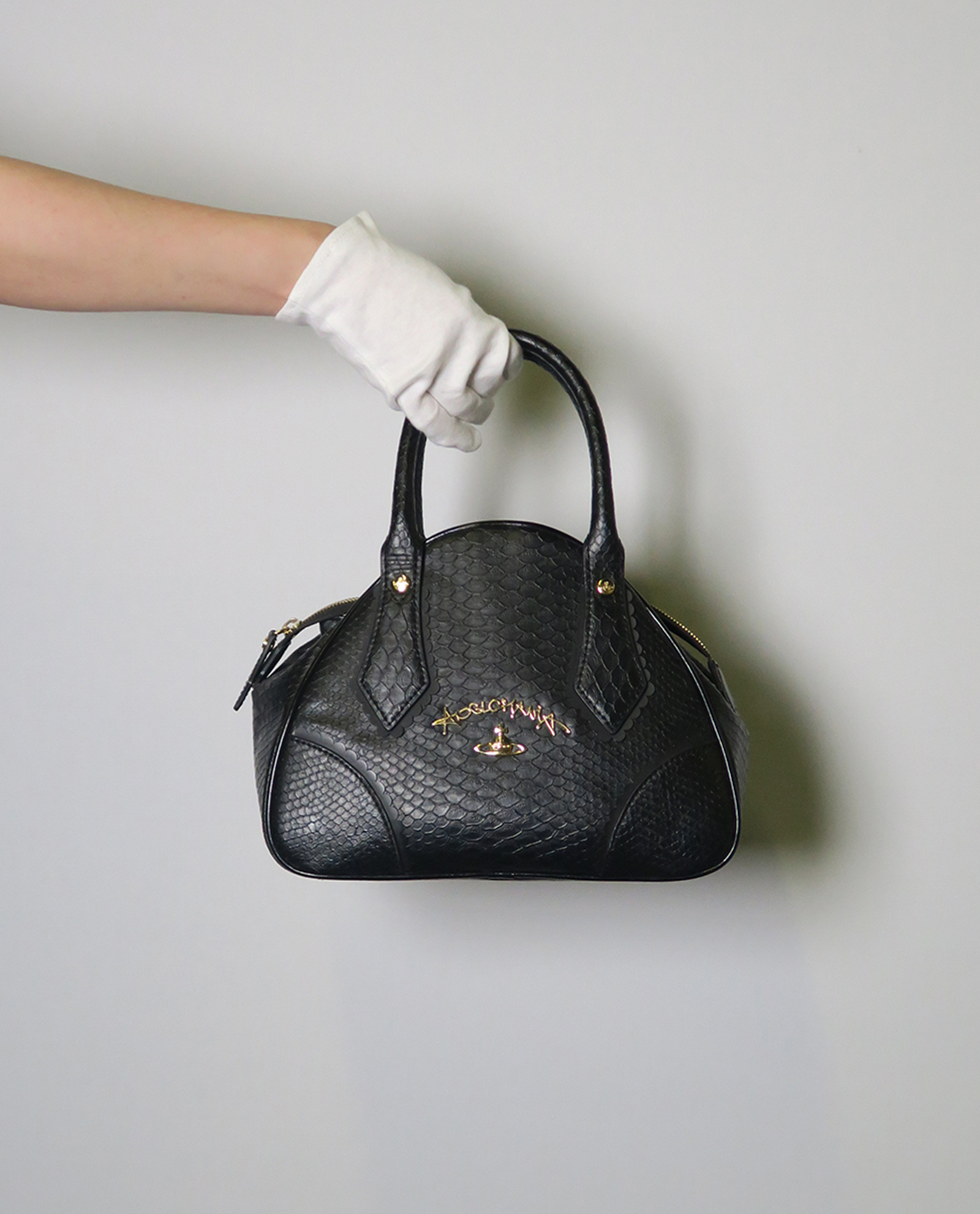 Vivienne westwood snake print on sale bag